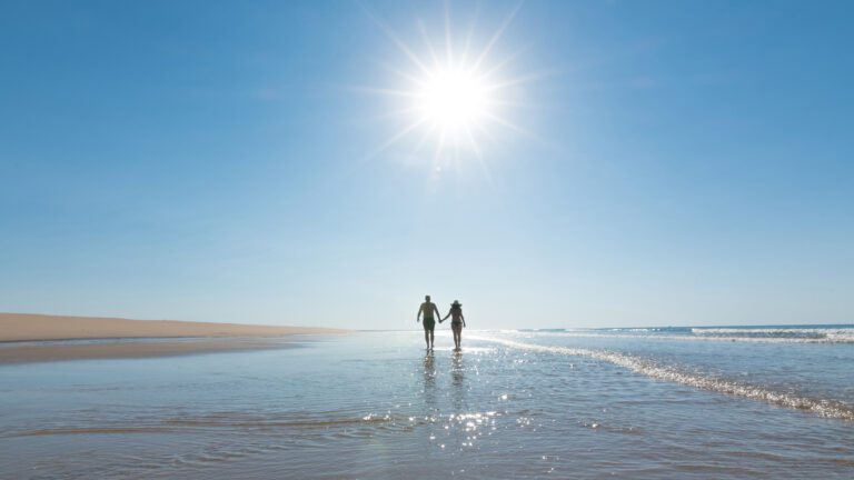 Couple walking on the beach