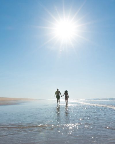 Couple walking on the beach